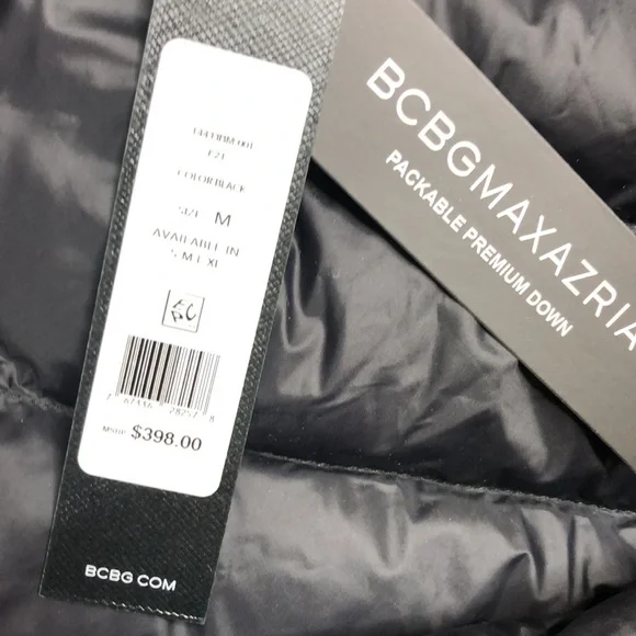 Bcbgmaxazria Black, puffy jacket with hood and bag to pack it and travel with